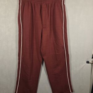 Burgundy track pants feature white piping along the sides (P423)